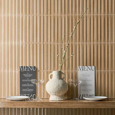 gazelle glazed porcelain decorative wall tile on shelf