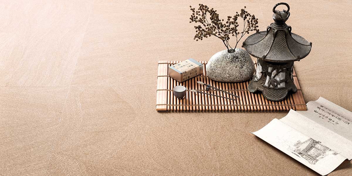 Ink large-format porcelain tile in modern interior with artistic linework design