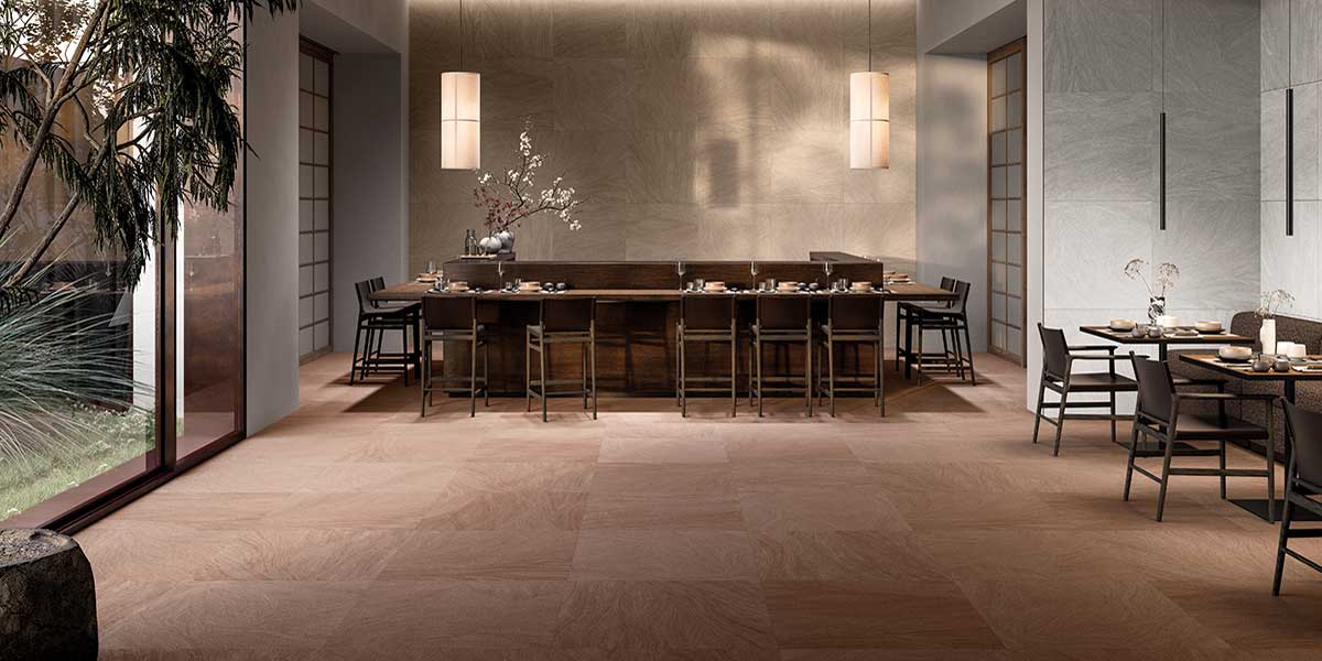 Ink Cozy porcelain tile installation with subtle graphic texture and calming tones