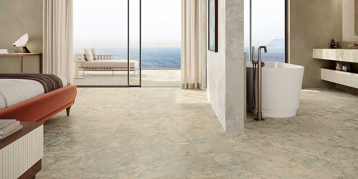 “Venere porcelain tile bathroom with warm taupe stone tones and luxurious natural movement