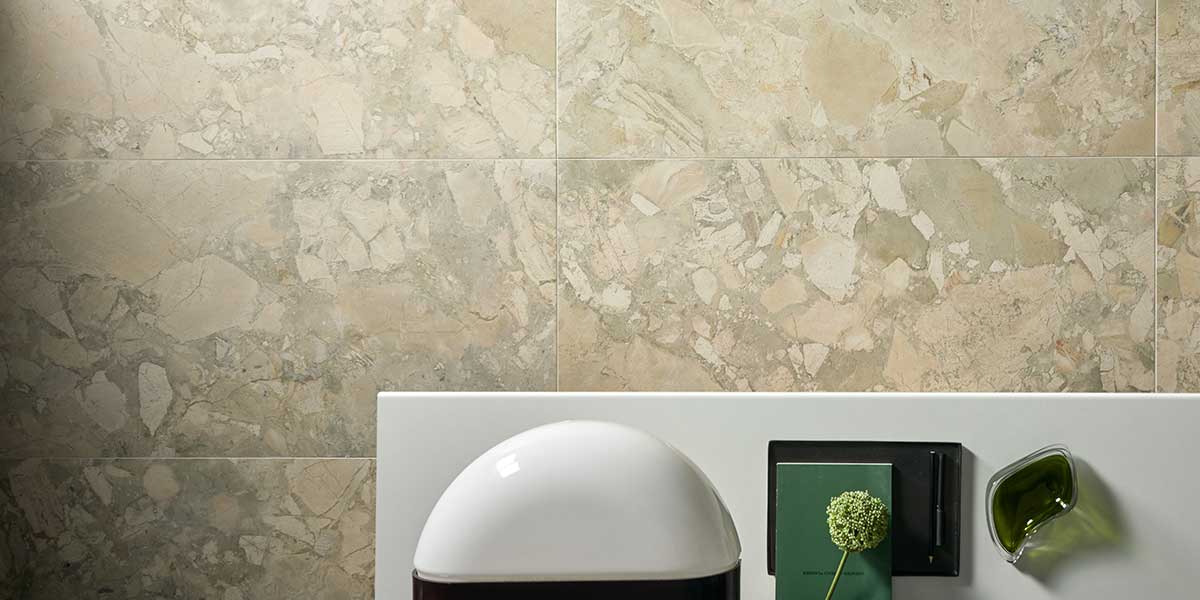 Venere stone-look porcelain tile with layered stone fragments and elegant movement