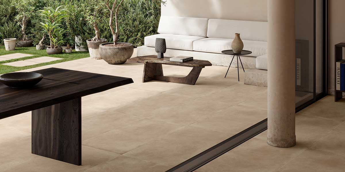 Bowery Beige porcelain tile installed on a modern outdoor patio