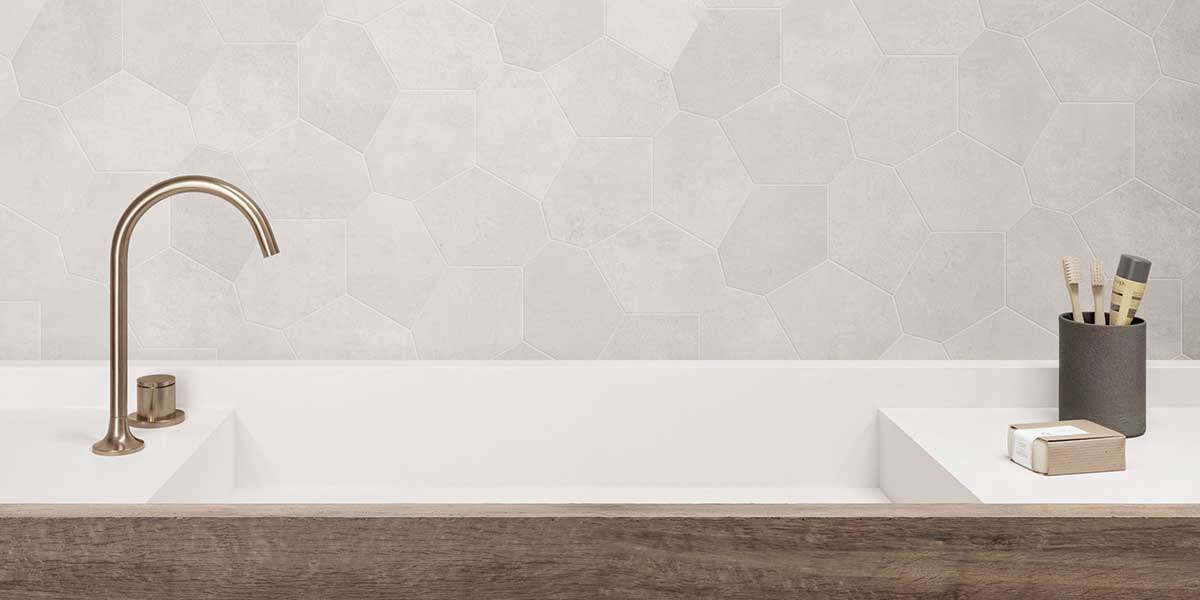 Bowery White porcelain mosaic tile installed as a bathroom feature wall