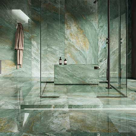 Luxury bathroom featuring Prestigio Kaleidos Smeraldo green marble-look porcelain tile on floors and walls.