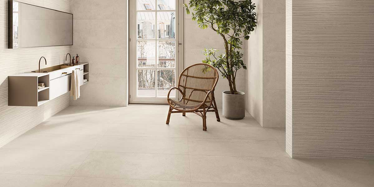 Modern bathroom featuring Pure Concrete White concrete-look porcelain tile and textured feature wall.