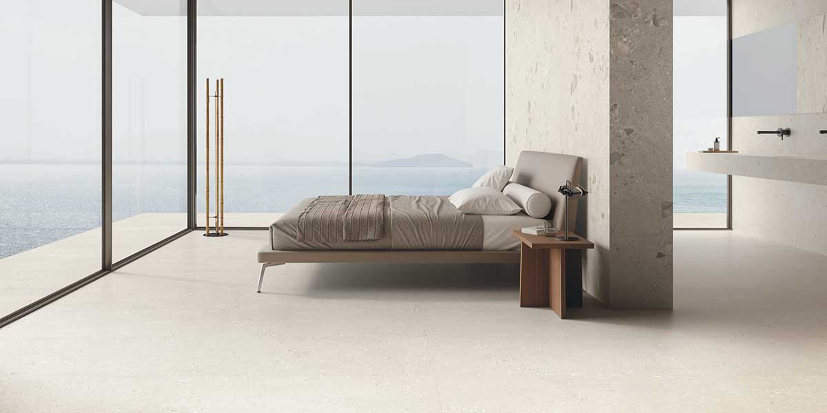Modern bedroom and bathroom featuring Sale Fine and Giant GemmaStone porcelain tile by Ergon