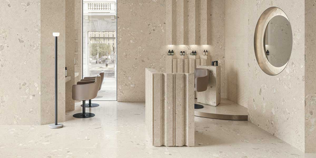Luxury salon featuring Sabbia Giant Lappato Antique, Fine and Giant Onde GemmaStone porcelain tile