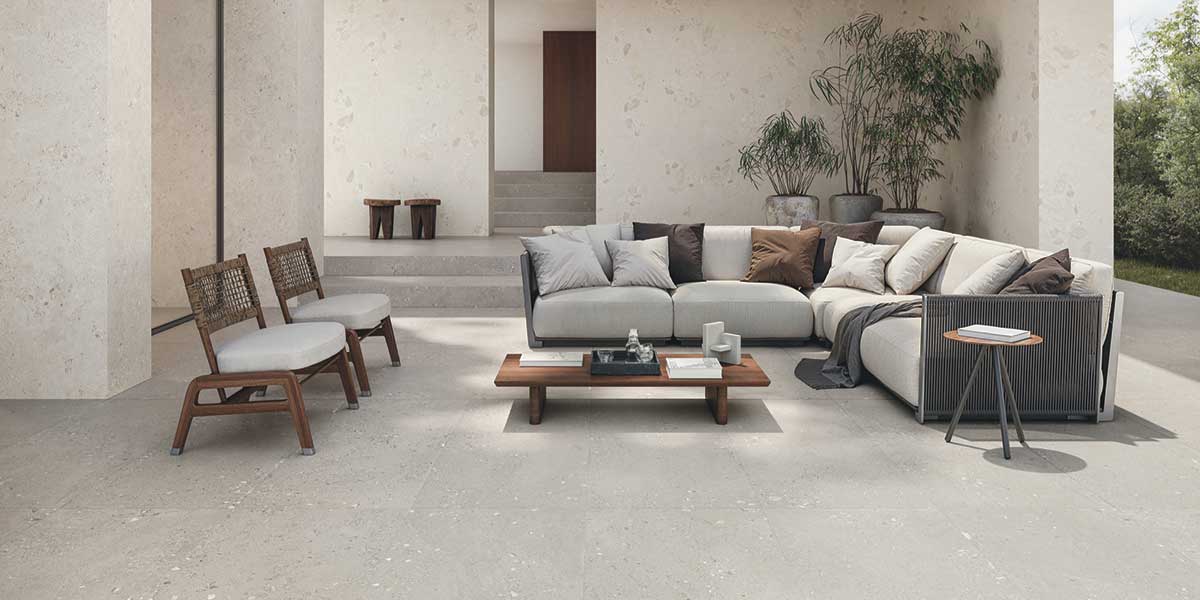 Outdoor patio featuring GemmaStone porcelain tile by Ergon in Greige Fine and Sale Giant