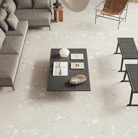 Modern living room featuring GemmaStone porcelain tile by Ergon