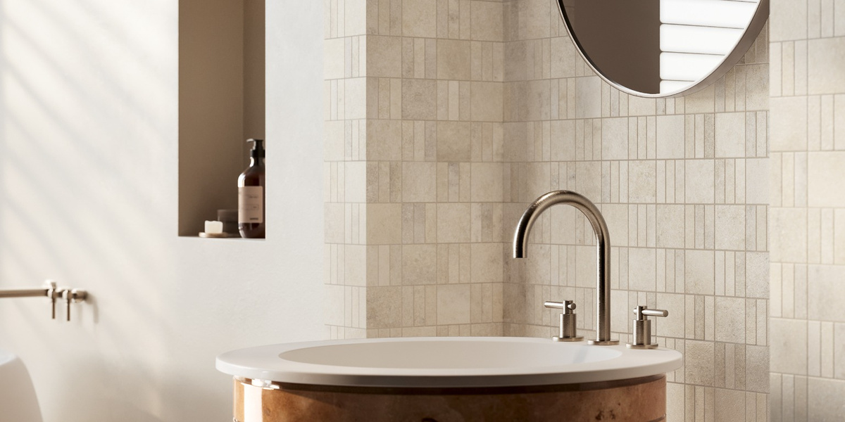 Close-up of Milano Sublime Lume Trama mosaic behind a bathroom vanity.