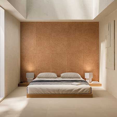 Cotto Milano Sabbia porcelain tile in a warm modern bedroom