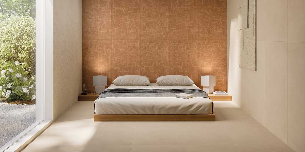 Cotto Milano Sabbia porcelain tile in a warm modern bedroom