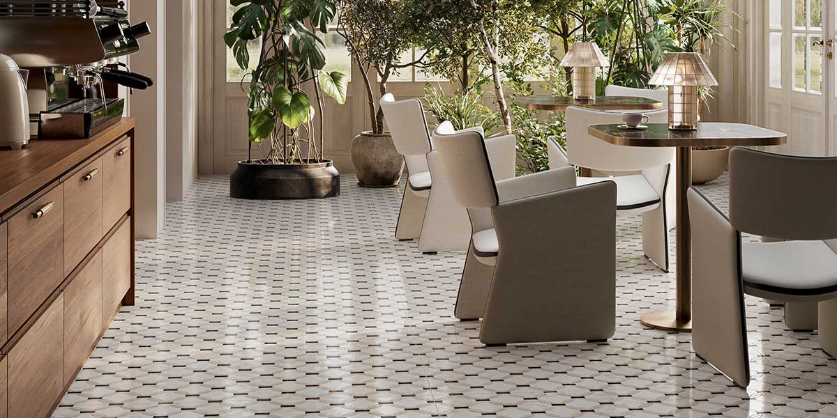 Doro & Malfi Cora decorative marble-look porcelain floor tile in a contemporary cafe