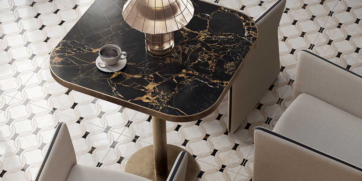 Doro & Malfi Cora decorative marble-look porcelain floor tile with curved cream and black pattern