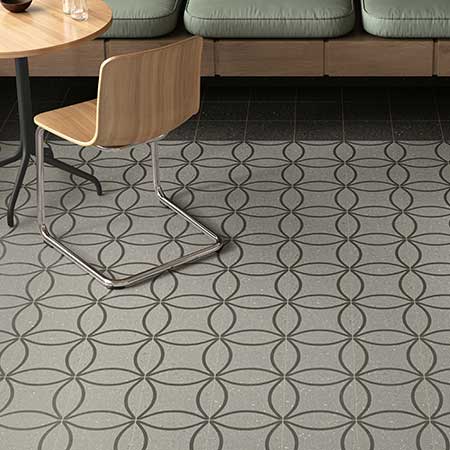 Isola decorative stone-look porcelain floor tile with gray and charcoal curved pattern