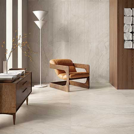 Pietra Di Orosei Grigio Conchiglia stone-look porcelain floor and decorative wall tile in a living room