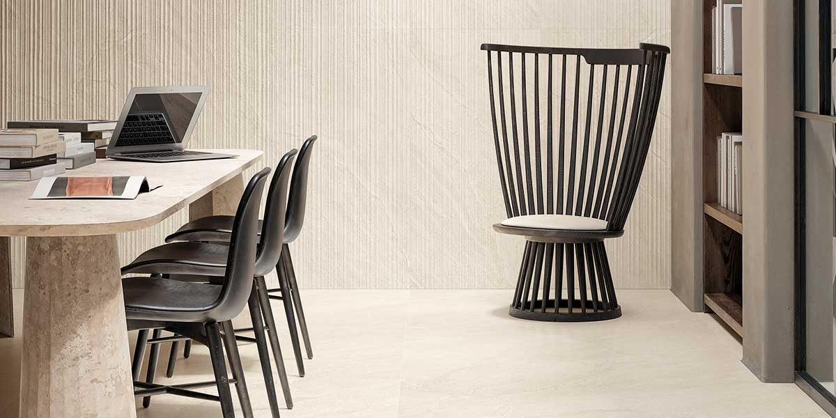 Pietra Di Orosei Perla stone-look porcelain floor and decorative wall tile in a contemporary office